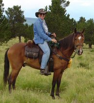 Photo of Nadine Meade on her Peruvian Paso horse, "Primero"